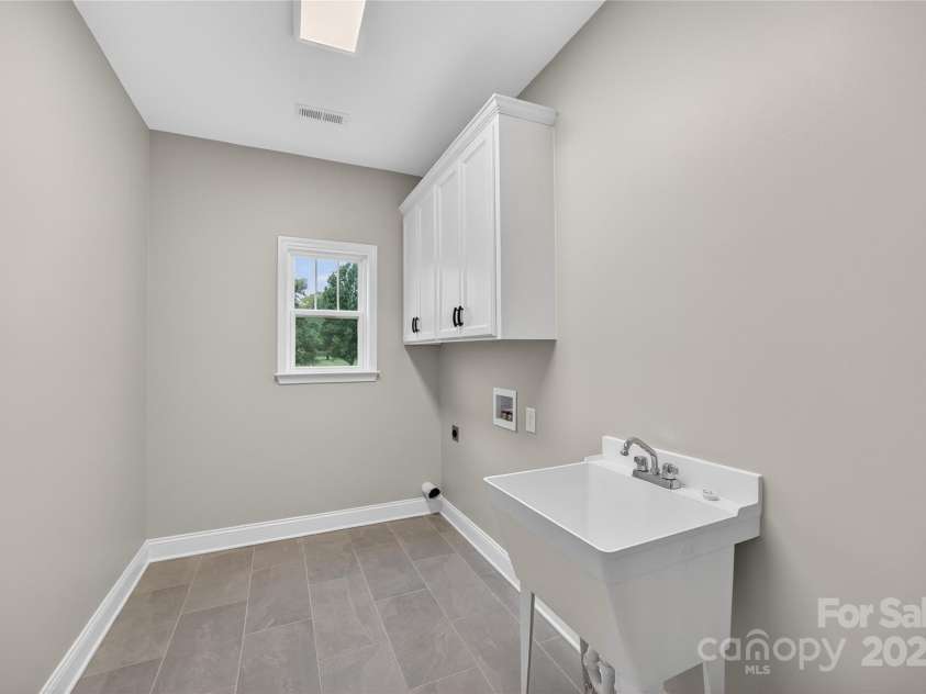 7245 Mooresville Road, Salisbury, NC 28147.  MLS# CAR4292031, YatesRealty ID 32050. Laundry