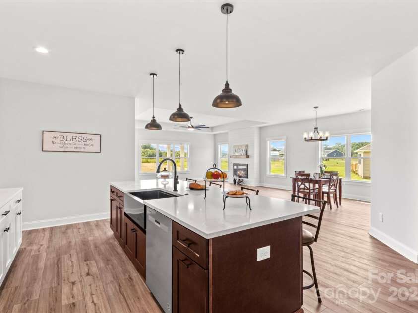 1260 Coppergate Drive, Salisbury, NC 28147.  MLS# CAR4273258, YatesRealty ID 32053. Another view of how Kitchen & Den & Dining open.