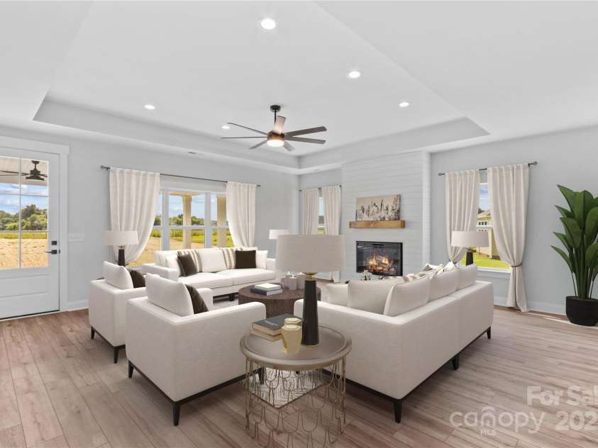 1260 Coppergate Drive, Salisbury, NC 28147.  MLS# CAR4273258, YatesRealty ID 32053. Den has 10 ft tray ceiling & shiplap wall fireplace.