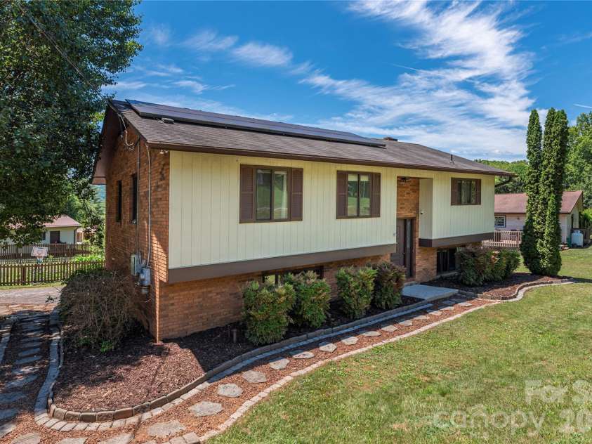99 Young Drive, Candler, NC 28715.  MLS# CAR4388636, YatesRealty ID 32054. 