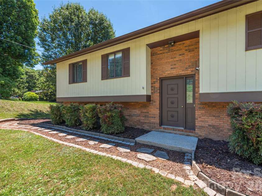 99 Young Drive, Candler, NC 28715.  MLS# CAR4388636, YatesRealty ID 32054. 