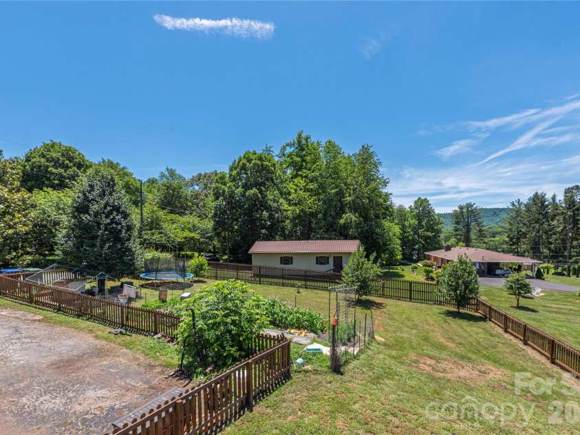 99 Young Drive, Candler, NC 28715.  MLS# CAR4388636, YatesRealty ID 32054. 
