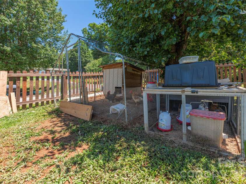 99 Young Drive, Candler, NC 28715.  MLS# CAR4388636, YatesRealty ID 32054. Chickens!!!