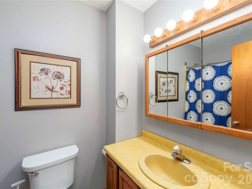 99 Young Drive, Candler, NC 28715.  MLS# CAR4388636, YatesRealty ID 32054. Hall full bath