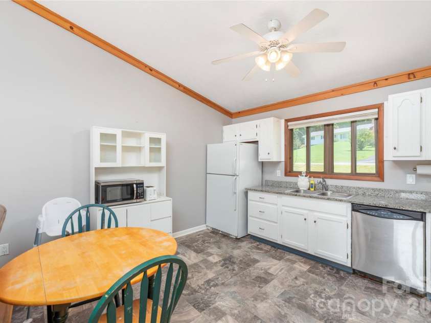 99 Young Drive, Candler, NC 28715.  MLS# CAR4388636, YatesRealty ID 32054. Open floor plan with cathedral ceilings