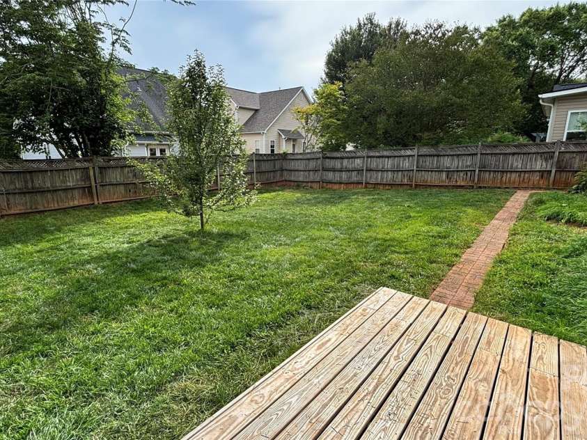 1408 Kenton Lane, Asheville, NC 28803.  MLS# CAR4390705, YatesRealty ID 32055. Back yard with deck