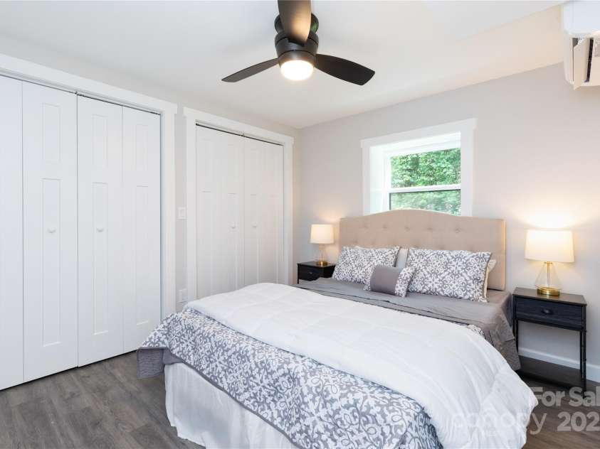 3 High Meadow Road, Asheville, NC 28803.  MLS# CAR4257892, YatesRealty ID 32055. Lower level bedroom