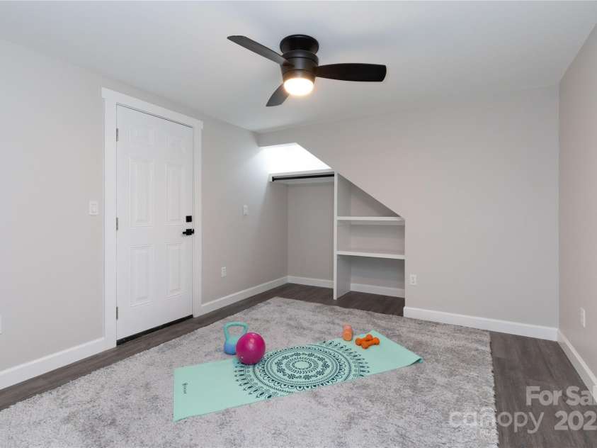 3 High Meadow Road, Asheville, NC 28803.  MLS# CAR4257892, YatesRealty ID 32055. Lower level bonus room