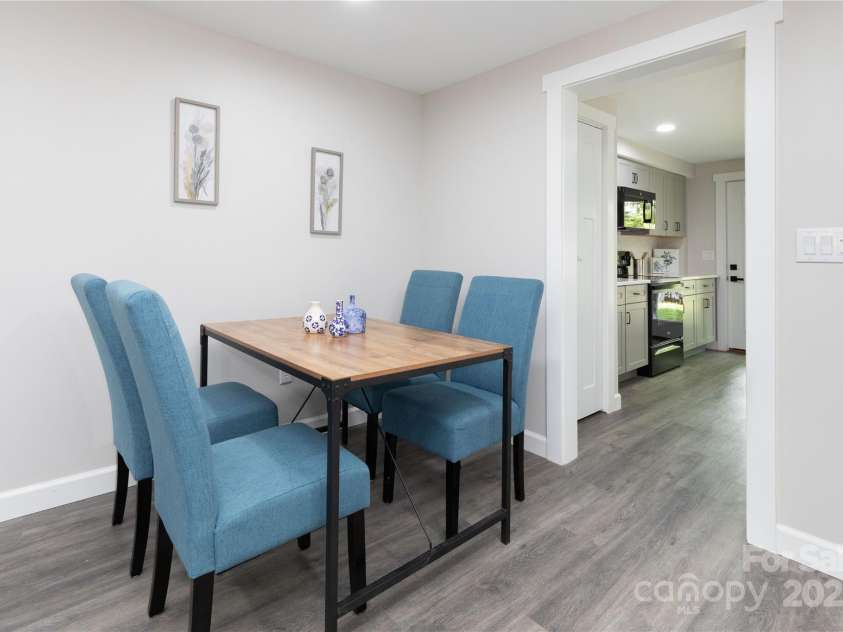 3 High Meadow Road, Asheville, NC 28803.  MLS# CAR4257892, YatesRealty ID 32055. Lower level dining doorway leading to kitchen