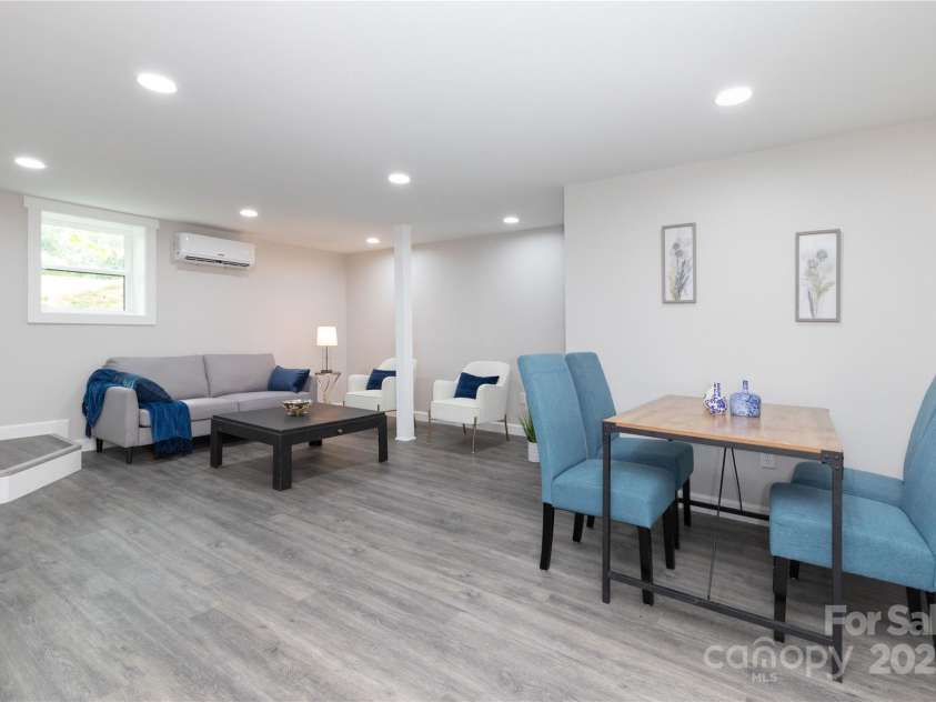 3 High Meadow Road, Asheville, NC 28803.  MLS# CAR4257892, YatesRealty ID 32055. Lower level living and dining