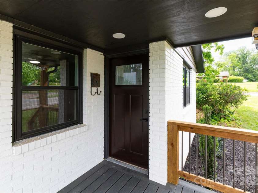 3 High Meadow Road, Asheville, NC 28803.  MLS# CAR4257892, YatesRealty ID 32055. Step inside to the living room