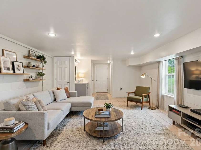 308 Browntown Road, Leicester, NC 28748.  MLS# CAR4419572, YatesRealty ID 32061. Photo Virtually Stagged ( Basement)