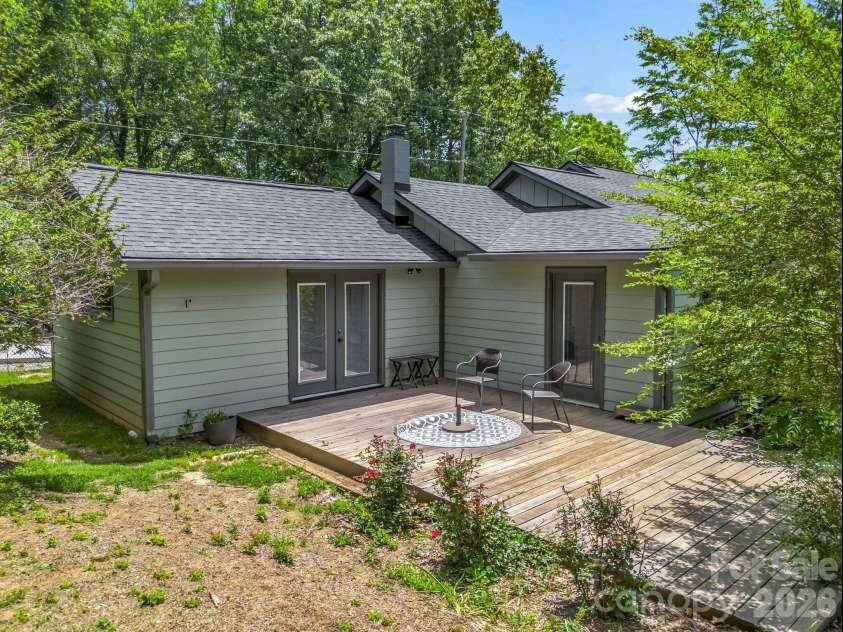 35 Chastain Hill Road, Mills River, NC 28759.  MLS# CAR4388520, YatesRealty ID 32063. Back Patio, viewed from Potting Shed