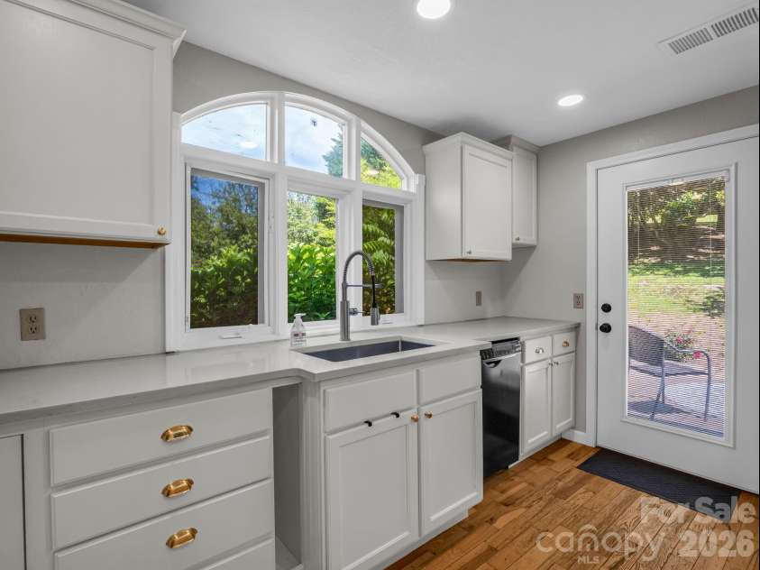 35 Chastain Hill Road, Mills River, NC 28759.  MLS# CAR4388520, YatesRealty ID 32063. Kitchen, facing Open Patio
