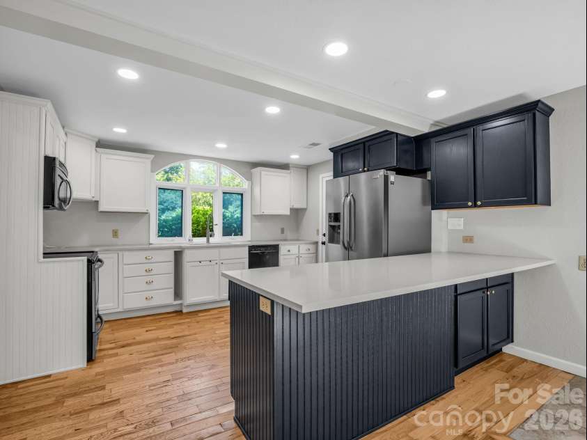 35 Chastain Hill Road, Mills River, NC 28759.  MLS# CAR4388520, YatesRealty ID 32063. Kitchen with Breakfast Bar
