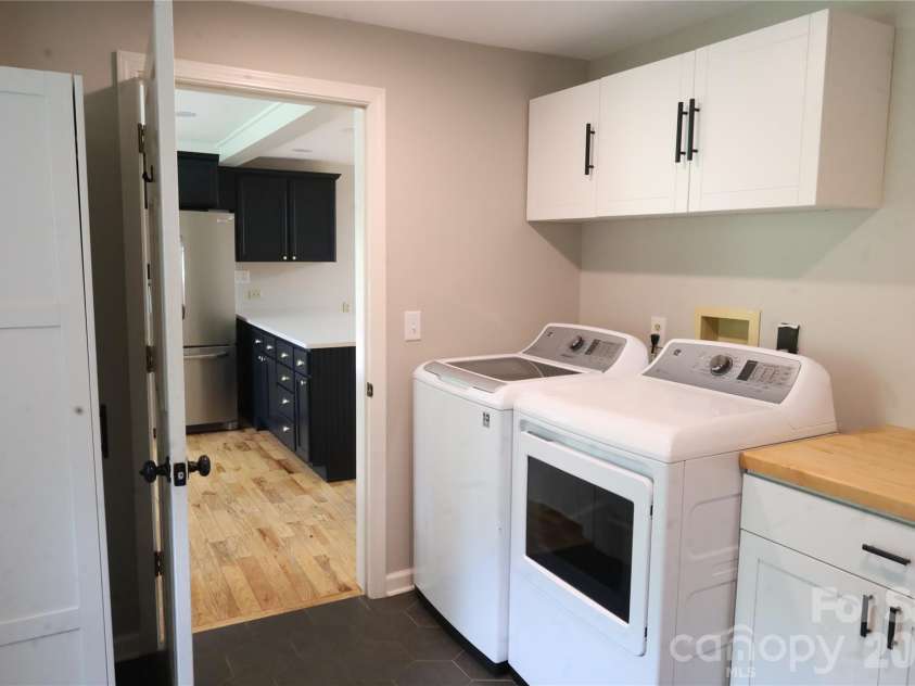 35 Chastain Hill Road, Mills River, NC 28759.  MLS# CAR4388520, YatesRealty ID 32063. Laundry Room, opens to Kitchen and includes Powder Room