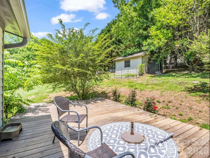 35 Chastain Hill Road, Mills River, NC 28759.  MLS# CAR4388520, YatesRealty ID 32063. Open Patio situated between Kitchen & Family Room