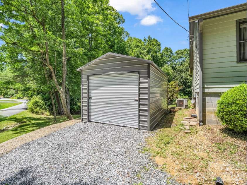 35 Chastain Hill Road, Mills River, NC 28759.  MLS# CAR4388520, YatesRealty ID 32063. Oversized storage building.  Large enough to garage a smaller vehicles