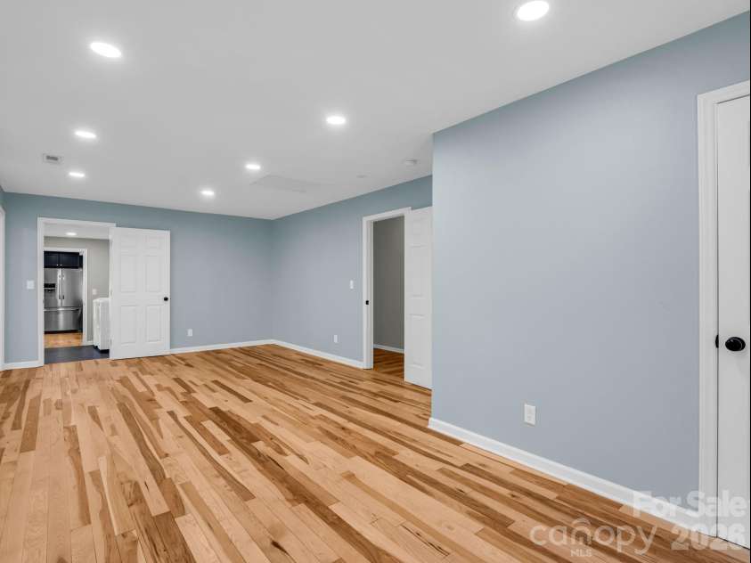 35 Chastain Hill Road, Mills River, NC 28759.  MLS# CAR4388520, YatesRealty ID 32063. Primary Bedroom Suite, with spa-inspired bath & dedicated office/private den