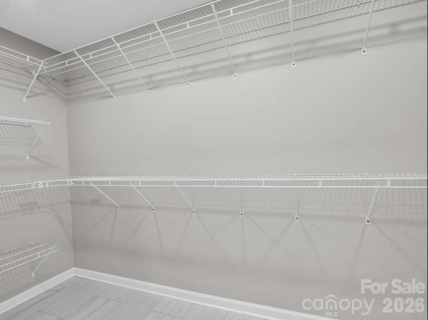 35 Chastain Hill Road, Mills River, NC 28759.  MLS# CAR4388520, YatesRealty ID 32063. Primary suite has two large walk-in closets