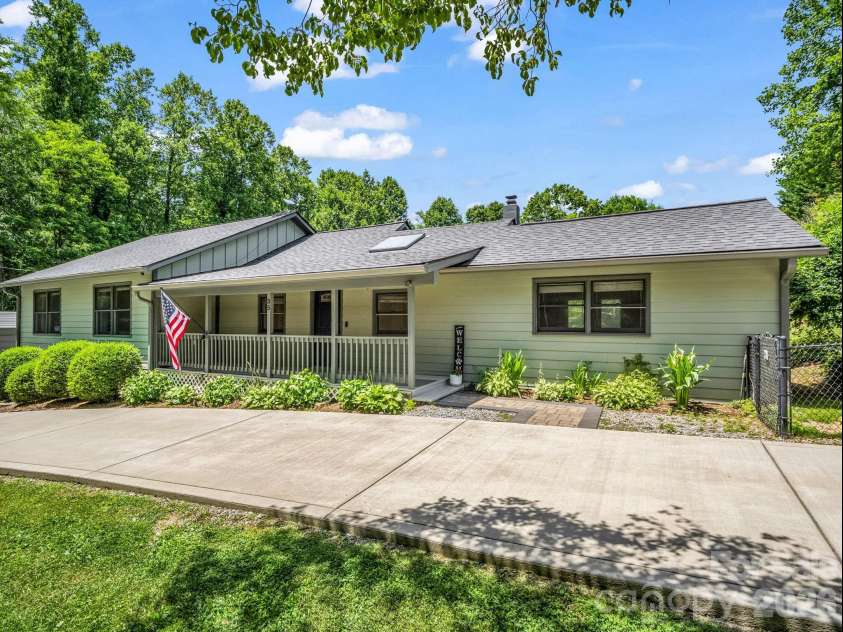 35 Chastain Hill Road, Mills River, NC 28759.  MLS# CAR4388520, YatesRealty ID 32063. View of home from front yard