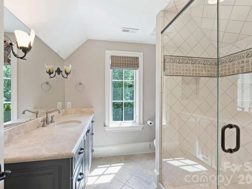 4901 Carmel Park Drive, Charlotte, NC 28226.  MLS# CAR4379174, YatesRealty ID 32065. Attached bathroom