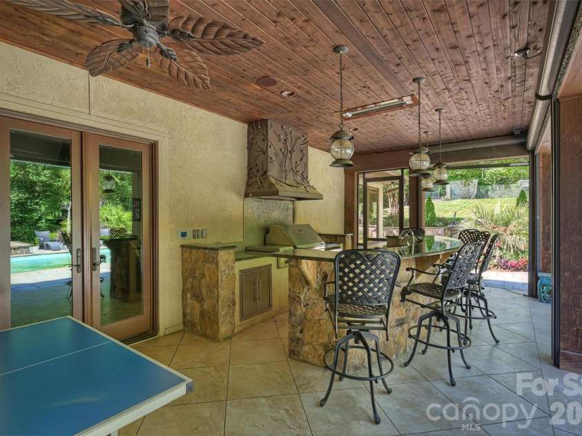 4901 Carmel Park Drive, Charlotte, NC 28226.  MLS# CAR4379174, YatesRealty ID 32065. Outdoor kitchen, ping pong, pool