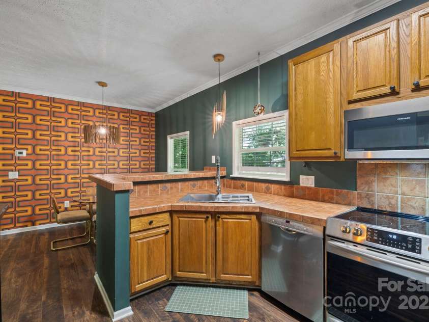 99 Indian Hill Drive, Leicester, NC 28748.  MLS# CAR4273750, YatesRealty ID 32072. 