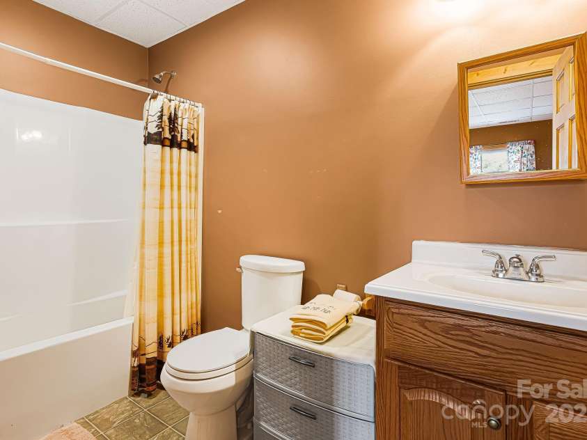 61 Turtle Rock Lane, Tuckasegee, NC 28783.  MLS# CAR4227707, YatesRealty ID 3208. Downstairs bath