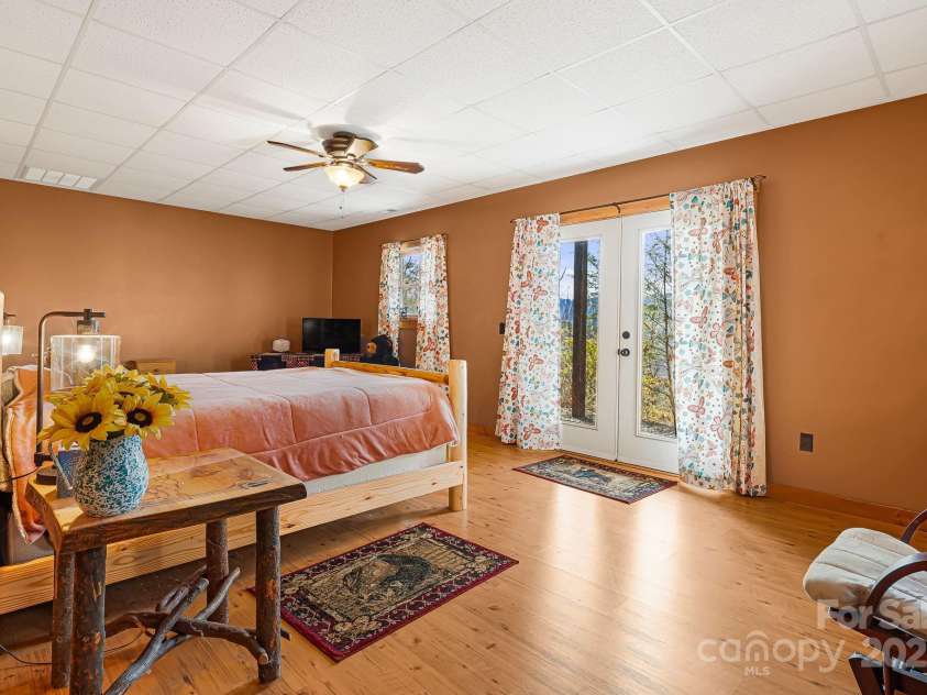 61 Turtle Rock Lane, Tuckasegee, NC 28783.  MLS# CAR4227707, YatesRealty ID 3208. Downstairs bedroom, could also be a game room