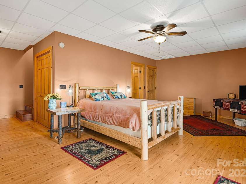 61 Turtle Rock Lane, Tuckasegee, NC 28783.  MLS# CAR4227707, YatesRealty ID 3208. Downstairs bedroom, could also be a game room