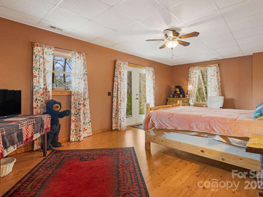 61 Turtle Rock Lane, Tuckasegee, NC 28783.  MLS# CAR4227707, YatesRealty ID 3208. Downstairs bedroom, could also be a game room
