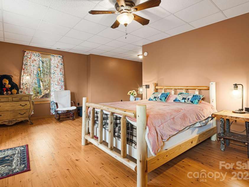 61 Turtle Rock Lane, Tuckasegee, NC 28783.  MLS# CAR4227707, YatesRealty ID 3208. Downstairs bedroom, could also be a game room