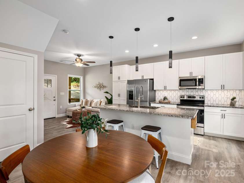 111 Mears Ridge Drive, Asheville, NC 28806.  MLS# CAR4265315, YatesRealty ID 32084. Natural light fills the main level