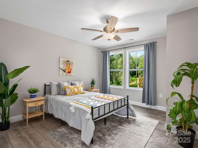 111 Mears Ridge Drive, Asheville, NC 28806.  MLS# CAR4265315, YatesRealty ID 32084. Second bedroom on upper level with natural light streaming in