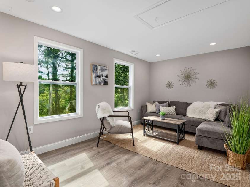 111 Mears Ridge Drive, Asheville, NC 28806.  MLS# CAR4265315, YatesRealty ID 32084. Upper level flexible space makes the perfect home office or quiet retreat