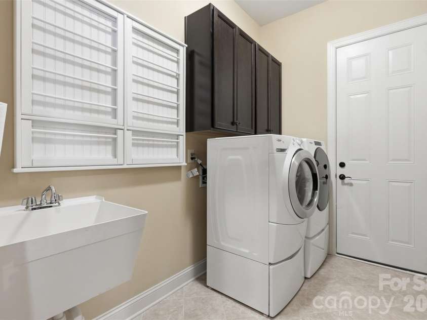 8094 Clems Branch Road, Indian Land, SC 29707.  MLS# CAR4388954, YatesRealty ID 32089. Laundry room- downstairs