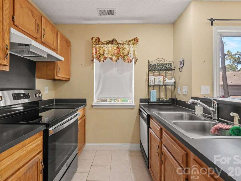 9132 Charminster Court, Charlotte, NC 28269.  MLS# CAR4394963, YatesRealty ID 32090. 