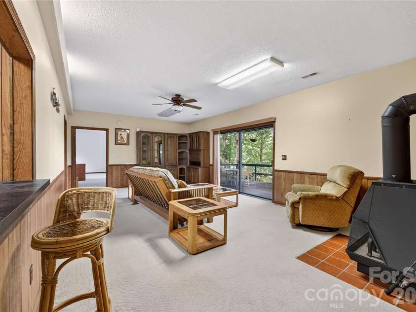118 Gagama Court, Brevard, NC 28712.  MLS# CAR4369667, YatesRealty ID 32094. Downstairs den