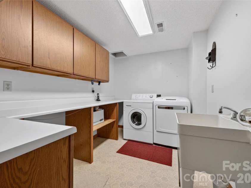 118 Gagama Court, Brevard, NC 28712.  MLS# CAR4369667, YatesRealty ID 32094. Laundry
