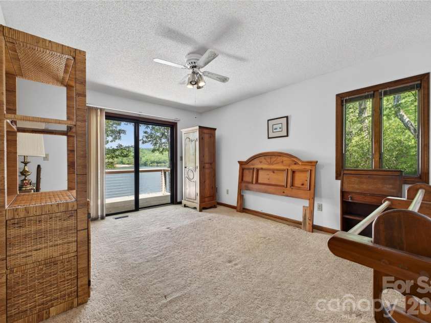 118 Gagama Court, Brevard, NC 28712.  MLS# CAR4369667, YatesRealty ID 32094. Primary bedroom