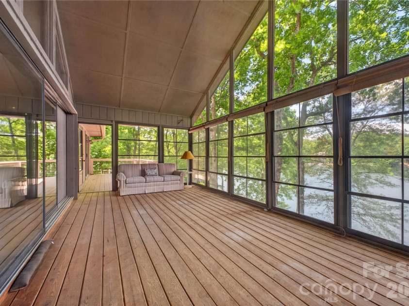 118 Gagama Court, Brevard, NC 28712.  MLS# CAR4369667, YatesRealty ID 32094. Sunroom