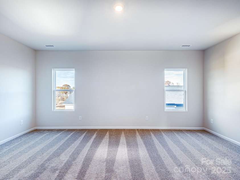 2511 Ruby Dixon Crossing Drive, Gastonia, NC 28056.  MLS# CAR4278229, YatesRealty ID 32094. Primary bedroom - Photo is representational