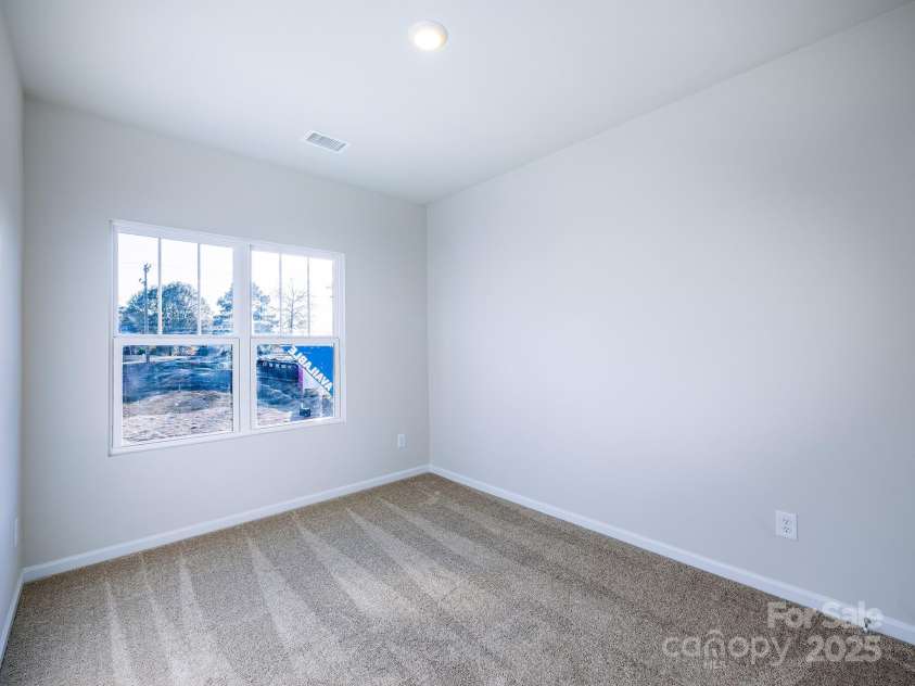 2511 Ruby Dixon Crossing Drive, Gastonia, NC 28056.  MLS# CAR4278229, YatesRealty ID 32094. Secondary bedroom - Photo is representational