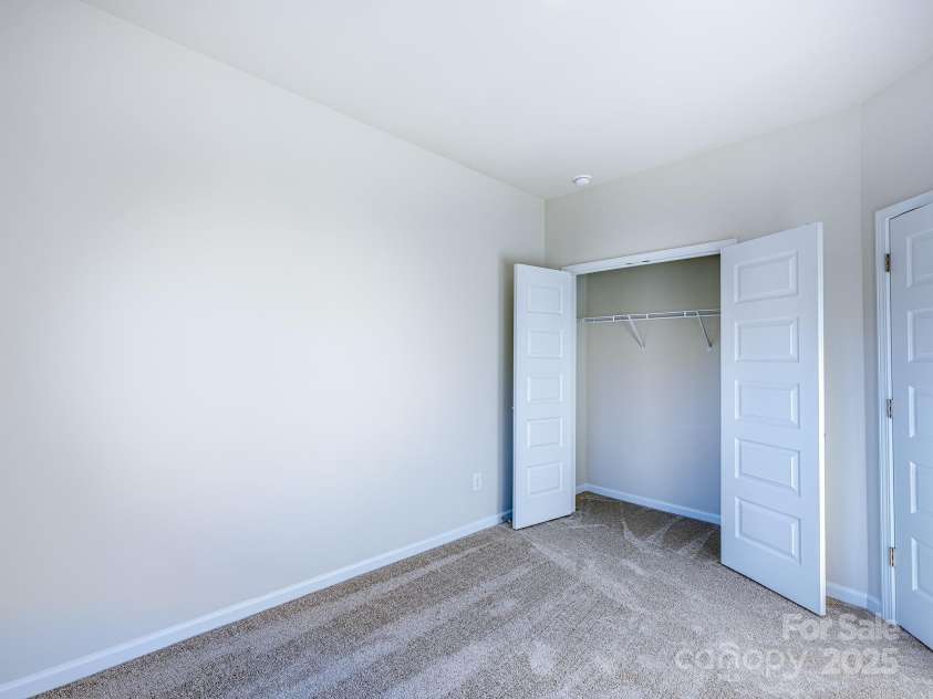 2511 Ruby Dixon Crossing Drive, Gastonia, NC 28056.  MLS# CAR4278229, YatesRealty ID 32094. Secondary bedroom - Photo is representational