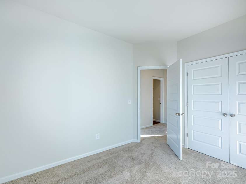 2511 Ruby Dixon Crossing Drive, Gastonia, NC 28056.  MLS# CAR4278229, YatesRealty ID 32094. Secondary bedroom - Photo is representational