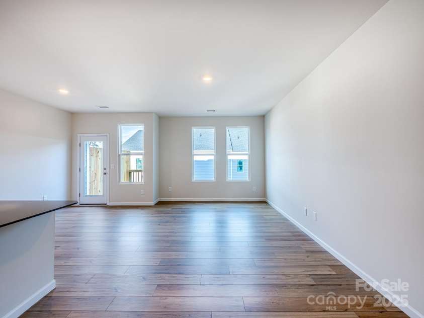2511 Ruby Dixon Crossing Drive, Gastonia, NC 28056.  MLS# CAR4278229, YatesRealty ID 32094. Spacious and open floor plan with large windows for natural light - Photo is representational