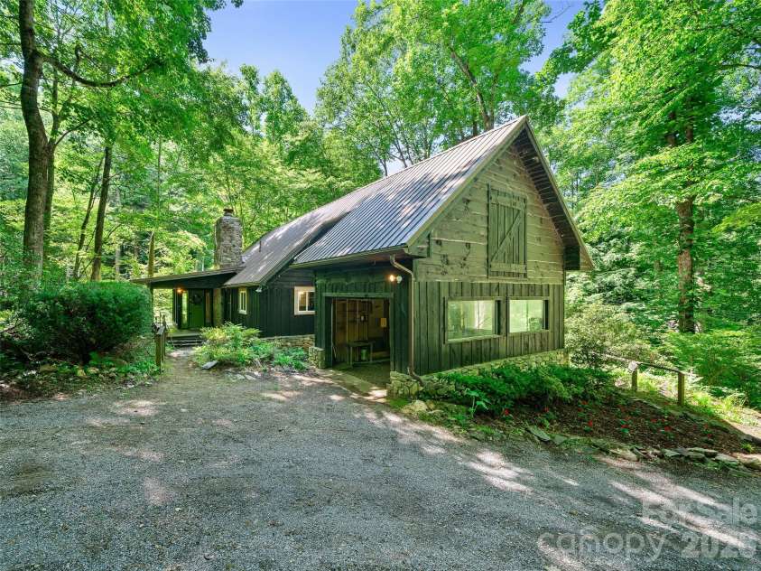 552 Fork Road, Burnsville, NC 28714.  MLS# CAR4395564, YatesRealty ID 32097. Home rest on .83 acre and is nearly flat 