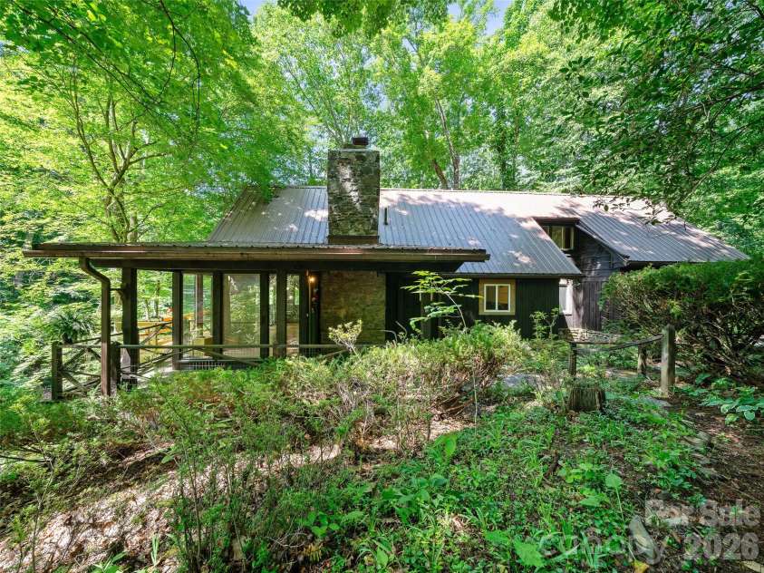 552 Fork Road, Burnsville, NC 28714.  MLS# CAR4395564, YatesRealty ID 32097. Side view of the home 