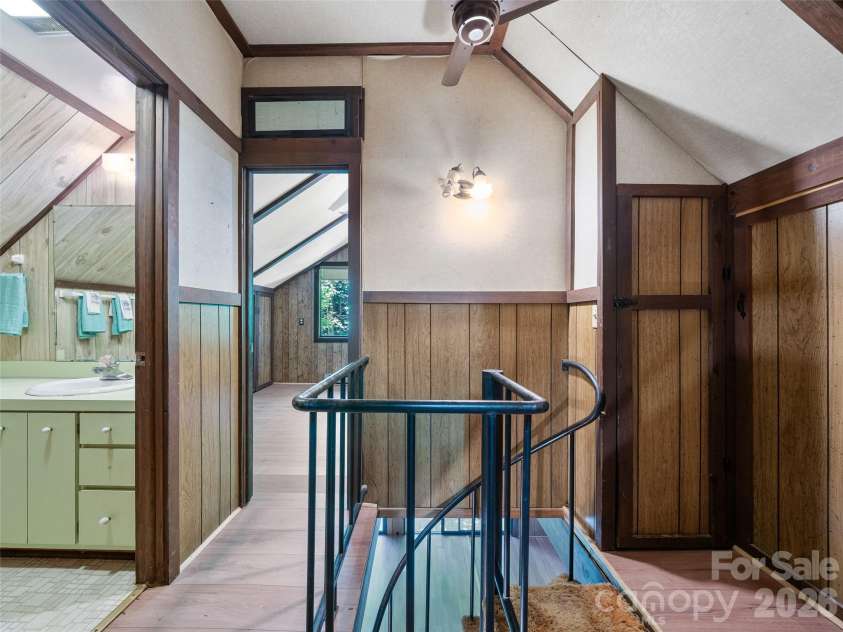 552 Fork Road, Burnsville, NC 28714.  MLS# CAR4395564, YatesRealty ID 32097. Upper access from Spiral staircase to 2 Bedrtooms and another full bath 